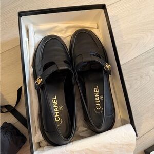 CHANEL Black Leather Loafers with Gold Detail
